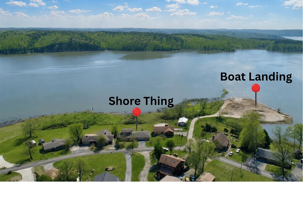 Shore Thing is waterfront and one house away from a small boat landing, water level permitting.