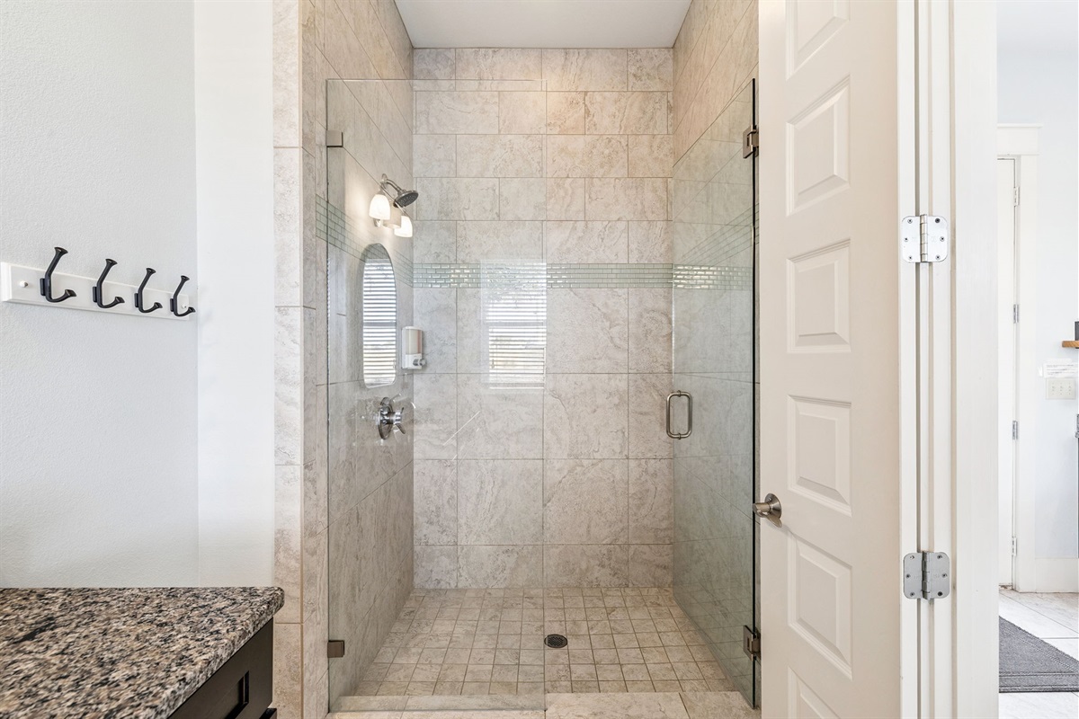 The mother-in-law's ensuite has a stand-in shower.