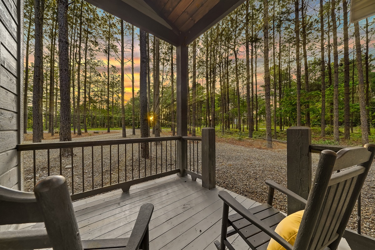 Both king bedrooms offer access to private porches with rocking chairs.