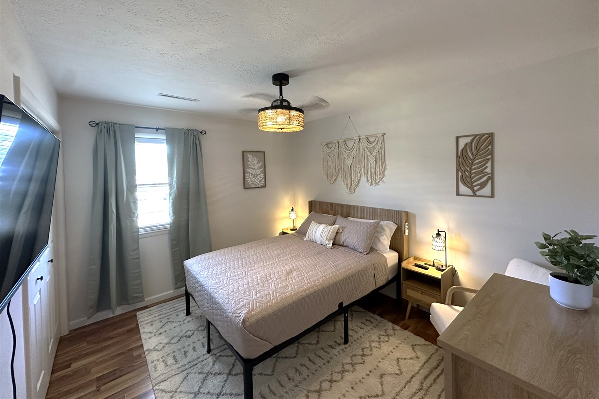 Queen bed, ceiling fan, closet and 43" smart TV