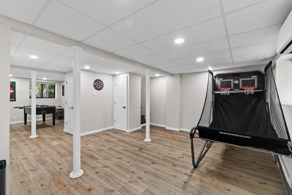 A dart wall game adds another layer of fun competition for group game nights.