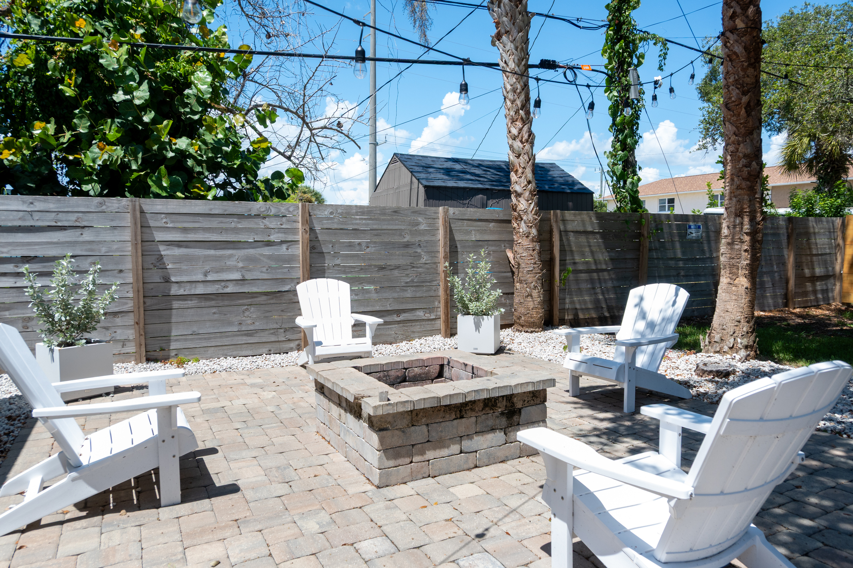 Shared fire pit and seating for all six suites