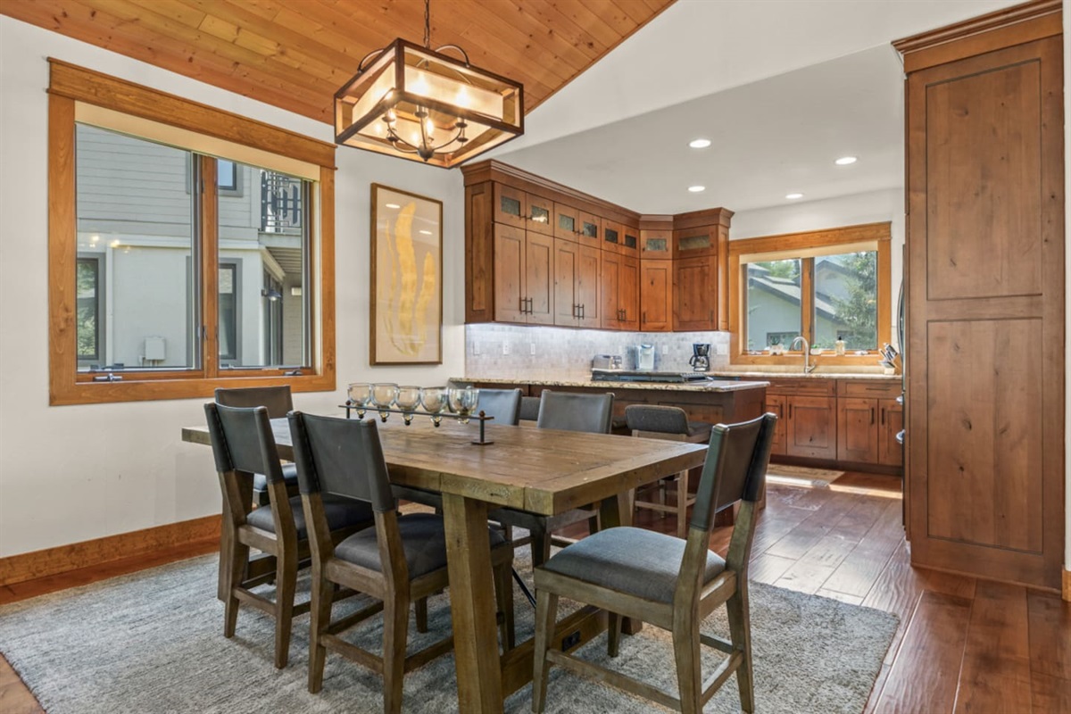 Dining Area & Kitchen in Background