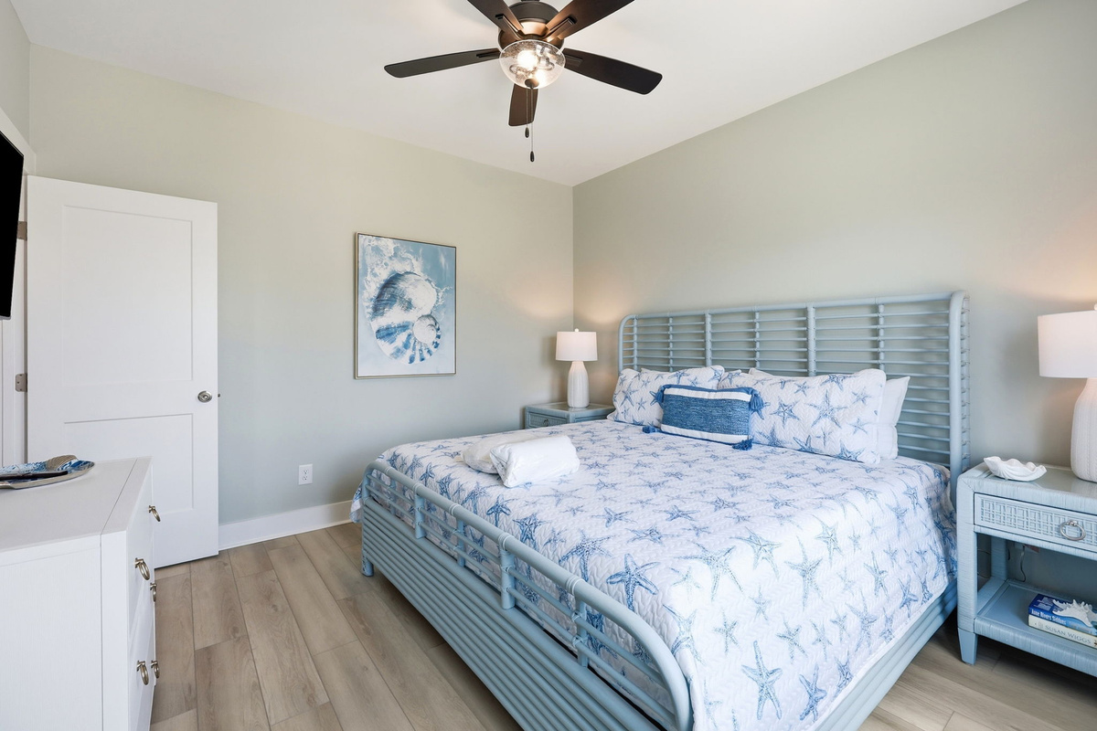 Designed with comfort in mind, this spacious king suite offers stylish furnishings, bedside tables, and a peaceful atmosphere after a day at the beach