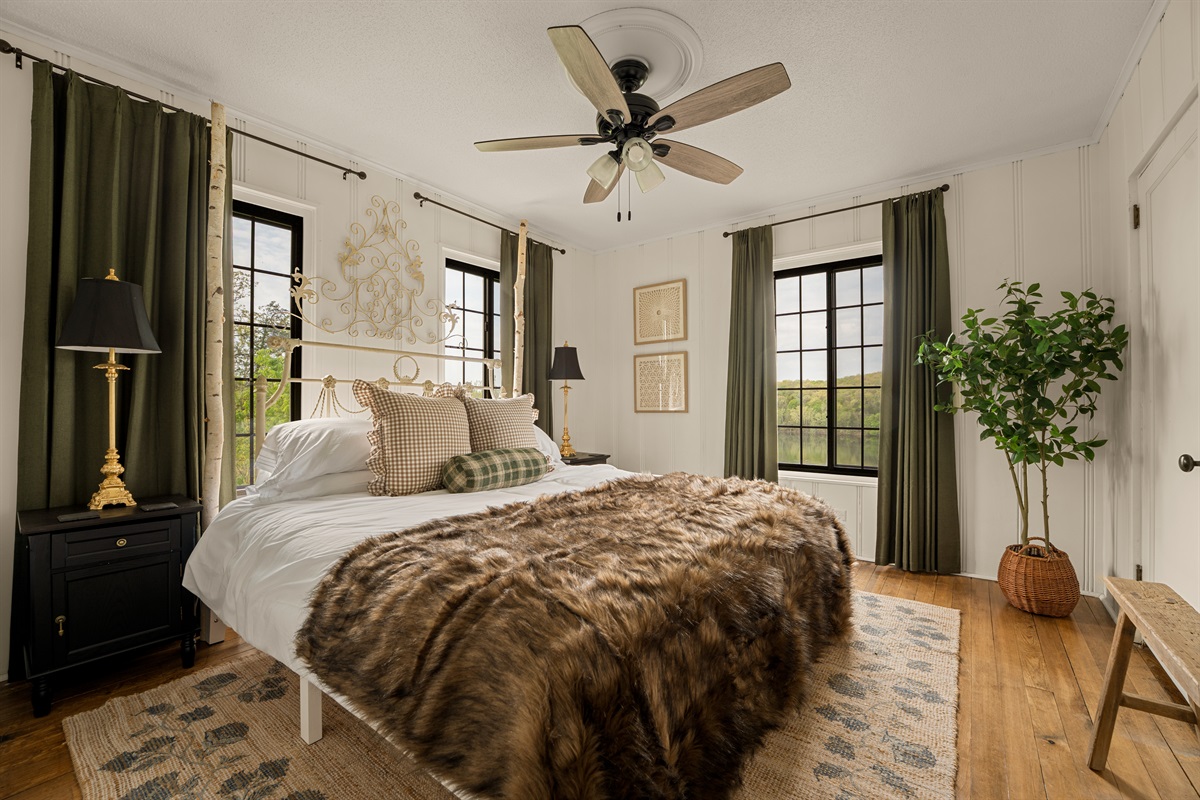 Wake up wrapped in comfort with peaceful views outside your window.