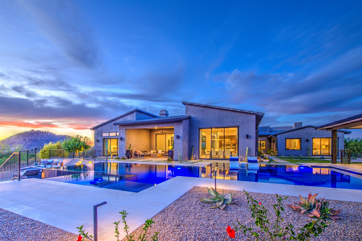 Amazing pocket doors open to the gorgeous outside with pool and views. 