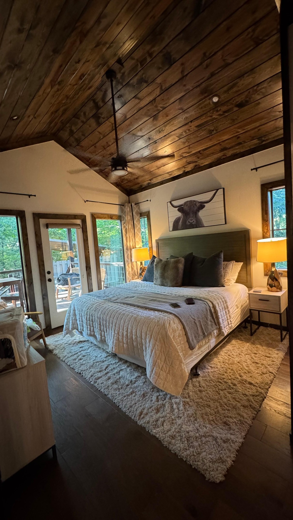Master bedroom - overlooking the Ouachita National Forest with private access to the large patio from the master bedroom.