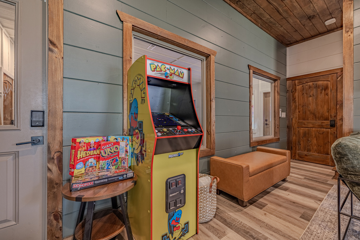 The arcade game adds classic fun to the lower-level game area.