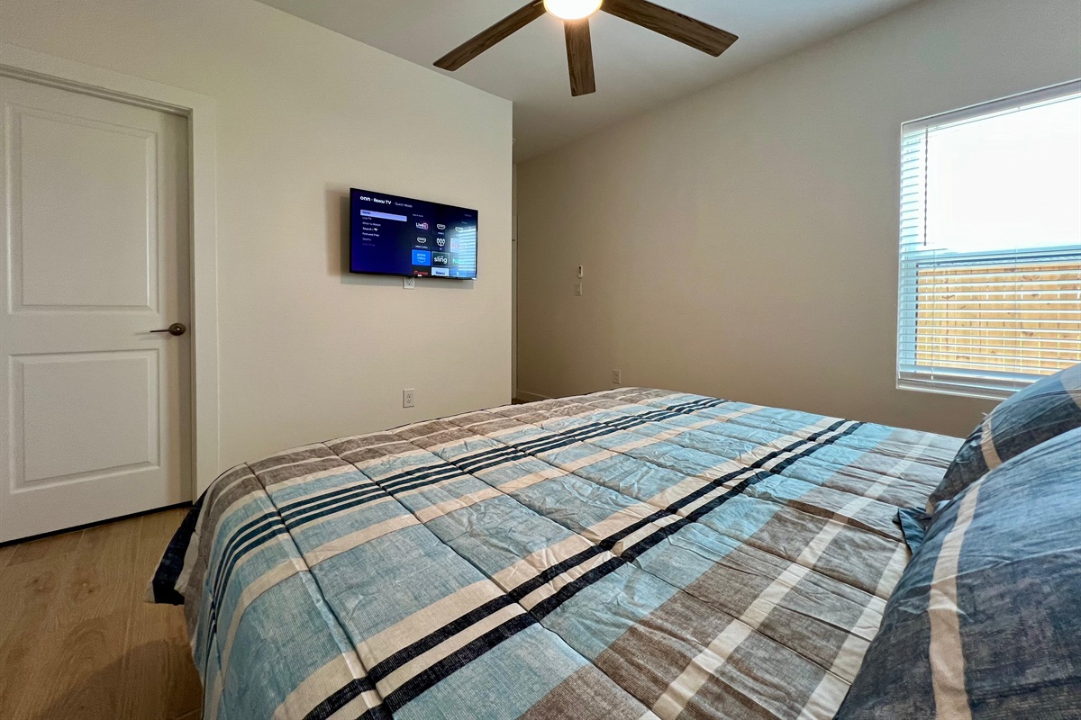 Primary Bedroom with King Bed and SmartTV