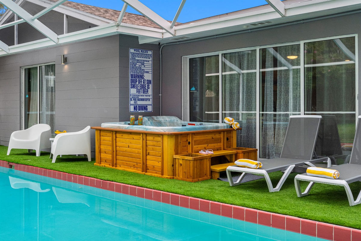 Soak your cares away in this tranquil hot tub, just steps from the pool and perfectly tucked under a screened-in lanai for year-round relaxation.