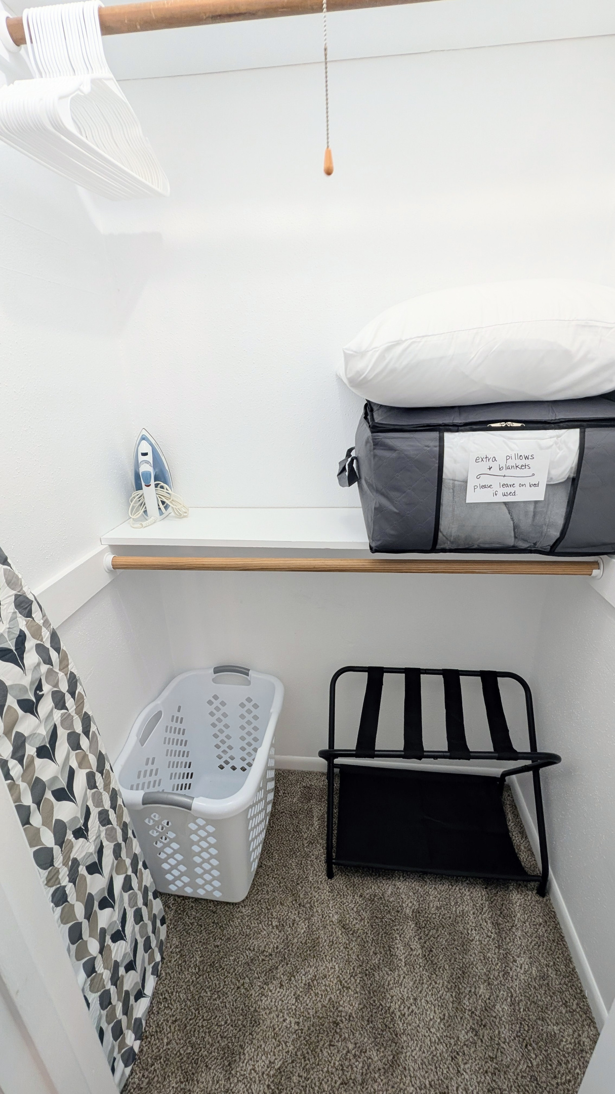 For your convenience, the closet is equipped with a full-sized iron and ironing board, along with extra pillows, blankets, hangers, a luggage rack, and a laundry hamper.