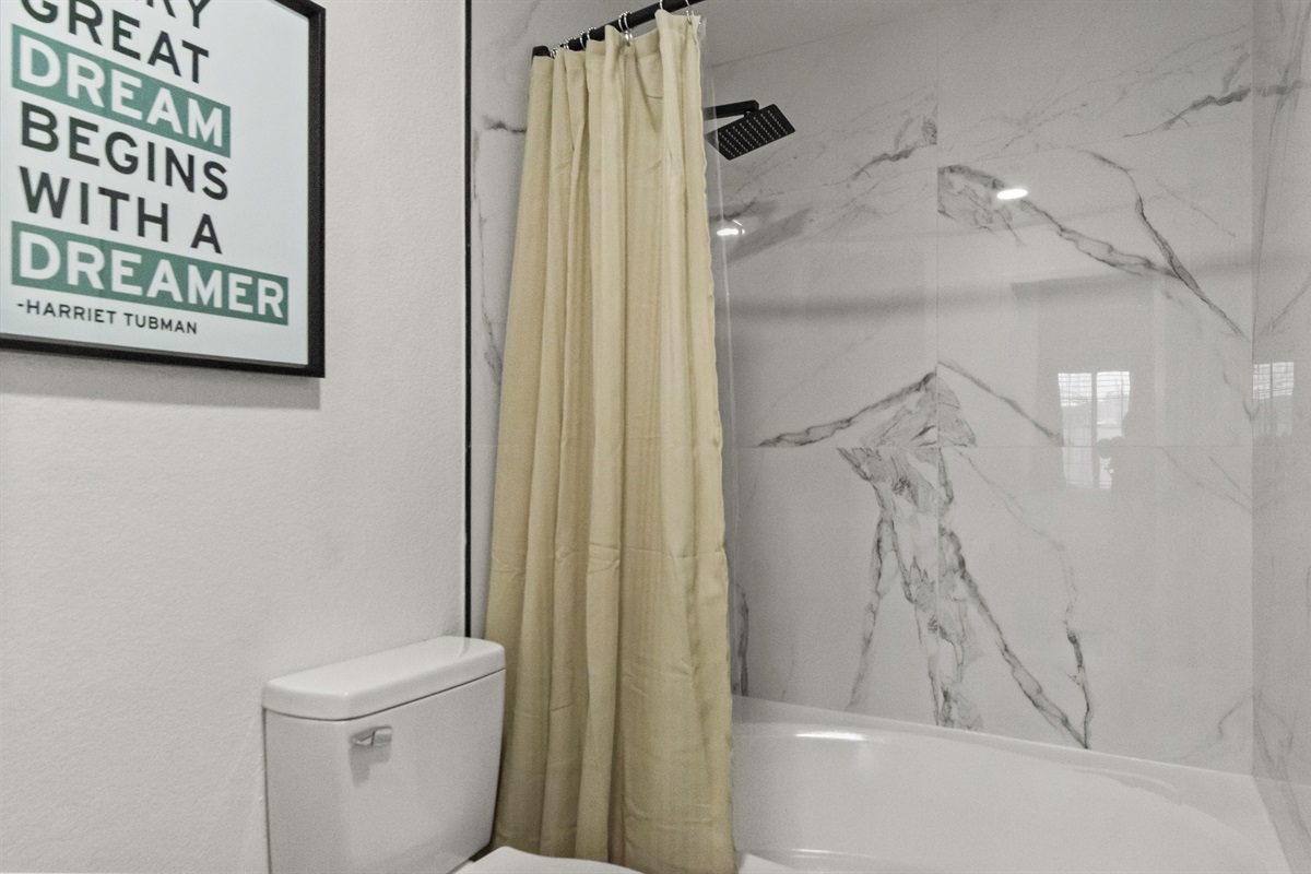 Spacious shower area designed for ultimate comfort.