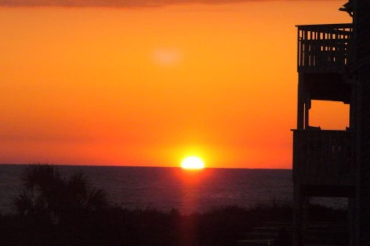 Watch the sun melt into the Gulf from Turtle Crawl &mdash; this is the view you'll talk about when you're back home.