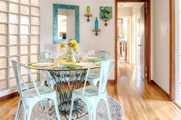 Dining room with door to kitchen and hallway to bedrooms