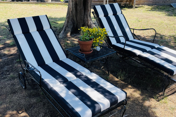 Vintage chaise lounge chairs under our big Red Cedar tree.