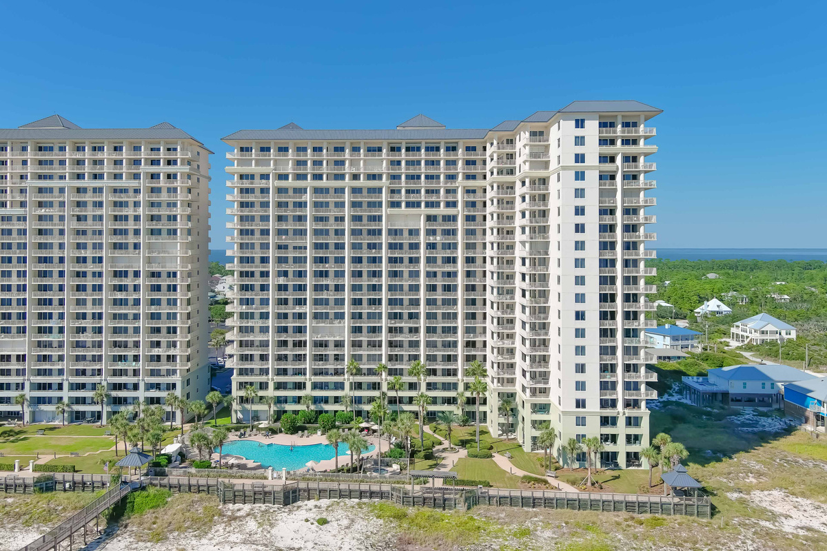 This prominent beachfront building stands as a testament to coastal architecture, providing residents and guests with an unparalleled seaside experience.
