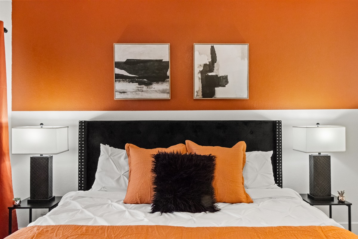 Wake up refreshed in a beautifully furnished bedroom with a comfortable mattress, luxury linens, and thoughtful touches for a relaxing stay.