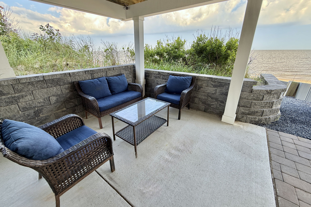 Step out onto your private, covered patio and take in the tranquility of the bay. Featuring comfortable lounge seating, it’s the perfect place to enjoy the sea breeze or simply unwind with a book while soaking in the waterfront view.