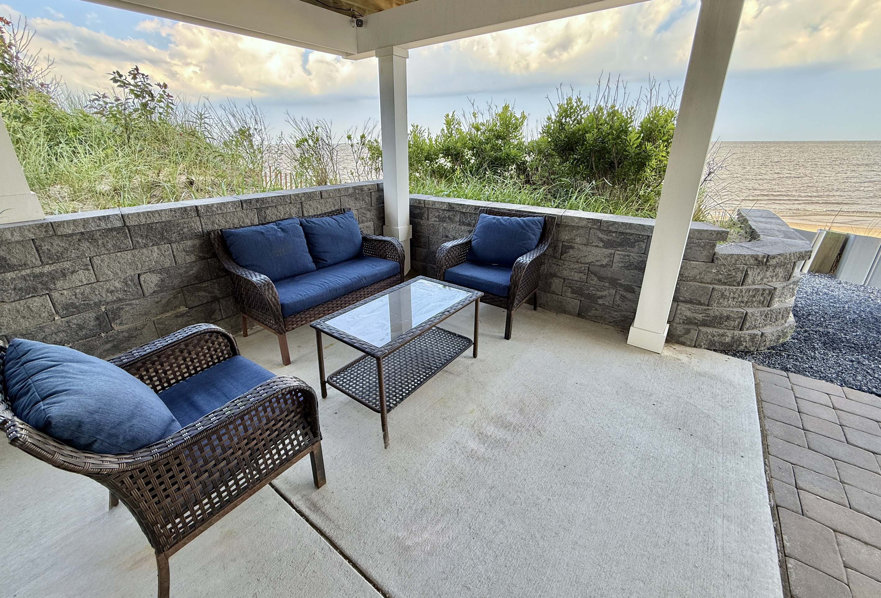 Step out onto your private, covered patio and take in the tranquility of the bay. Featuring comfortable lounge seating, it’s the perfect place to enjoy the sea breeze or simply unwind with a book while soaking in the waterfront view.