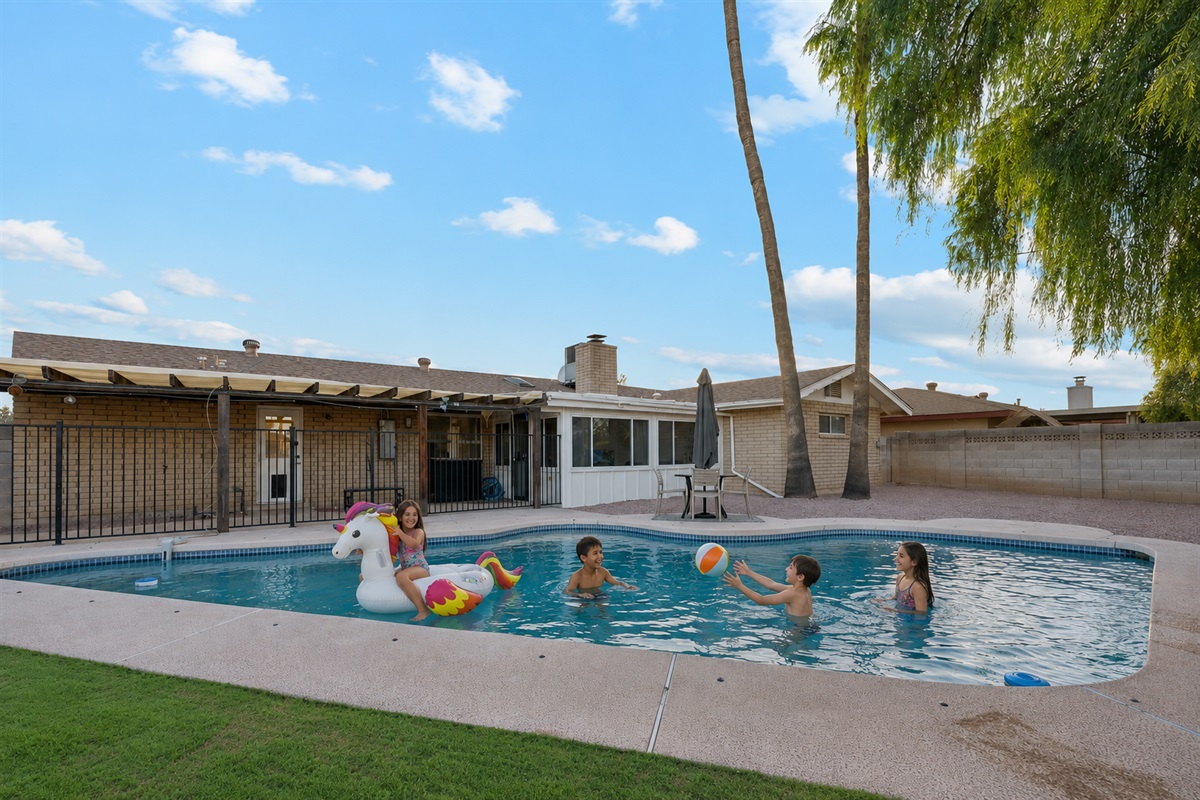 Take a dip in the large sparkling pool in your private, fenced back yard!