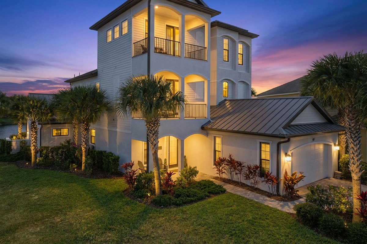 Sunset glow + coastal charm 🌅🏡
Arrive to a picture-perfect beach home wrapped in palm trees and warm evening light—your relaxing getaway starts the moment you pull in the driveway.