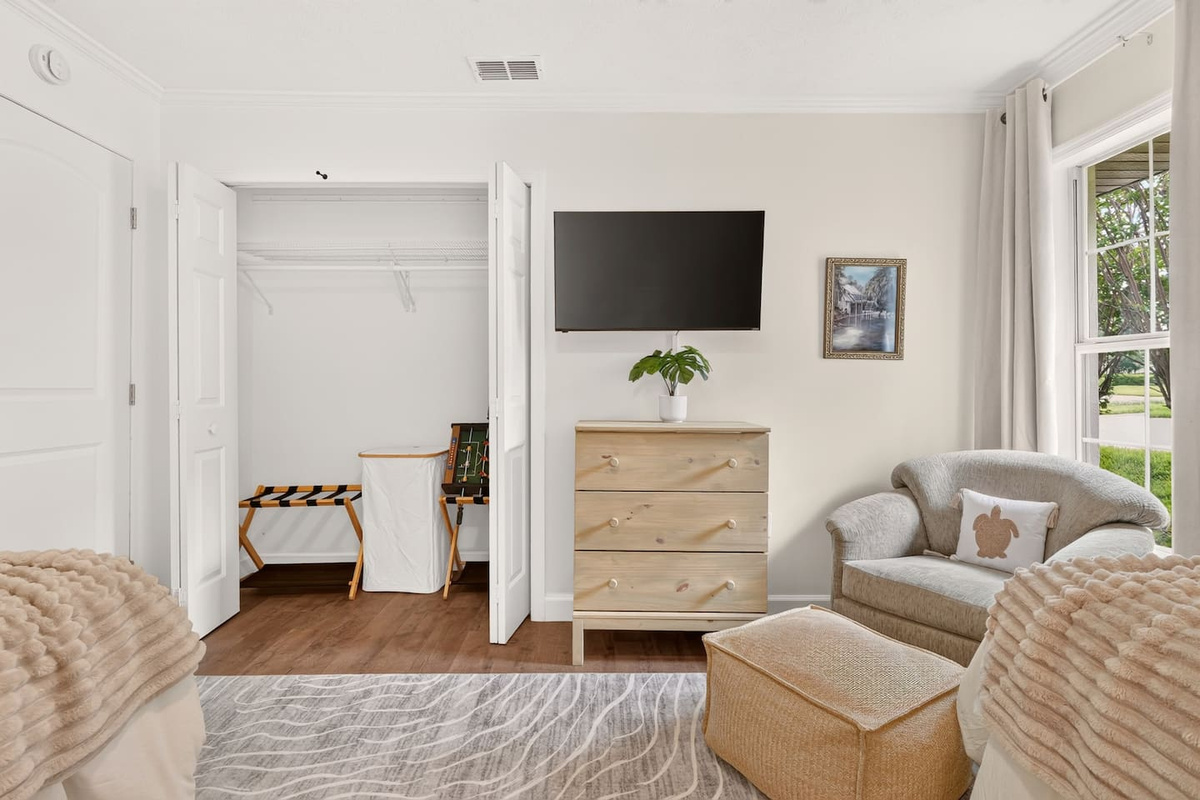 Bedroom #4 features two twin beds, a dresser, closet, luggage rack, hamper and ROKU TV.  PLEASE NOTE:  Streaming service is not provided.  You will need to log into your own streaming apps.