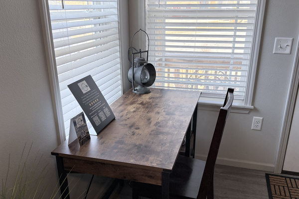 desk area with monitor