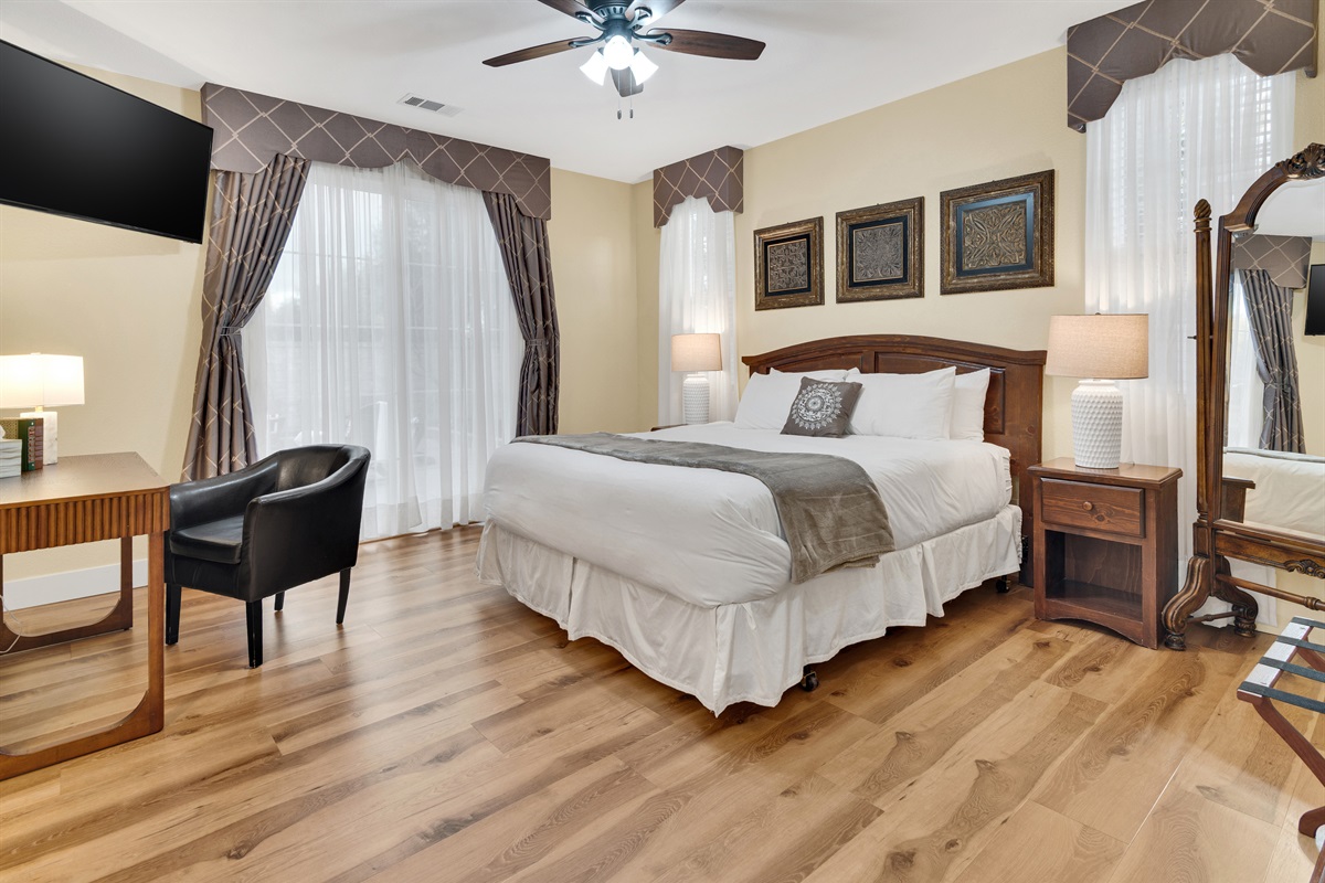 Enjoy the spacious primary bedroom suite, complete with King Bed, and 400-count, 100% cotton sheets. We offer both firm and soft pillow options for your ultimate comfort. Ensuite primary bathroom is attached. 
