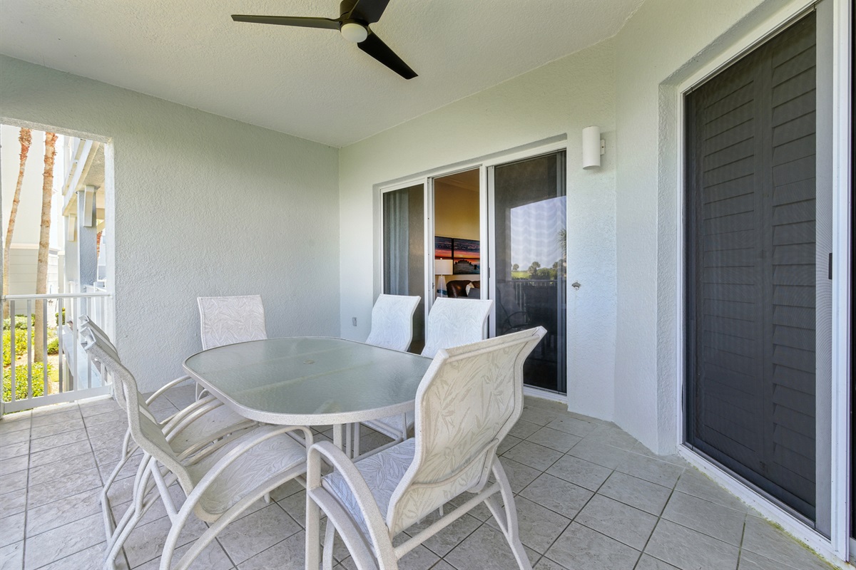 🌿☀️ Your private, covered balcony is the perfect spot to sip coffee in the morning or enjoy a sunset drink—complete with a dining table, ceiling fan breeze, and peaceful views just outside the living room. 🍹🌅
