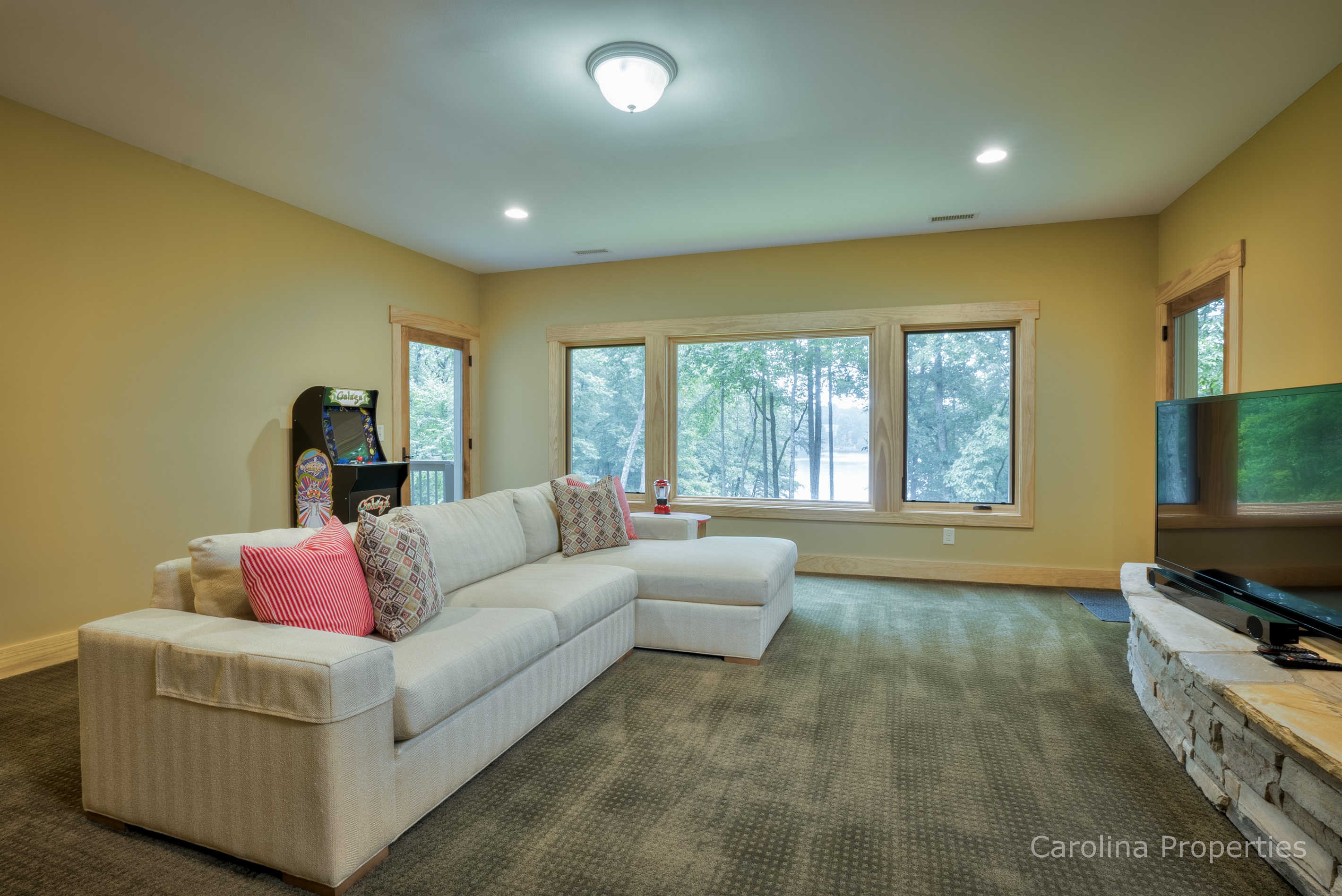 Additional view of living area with TV