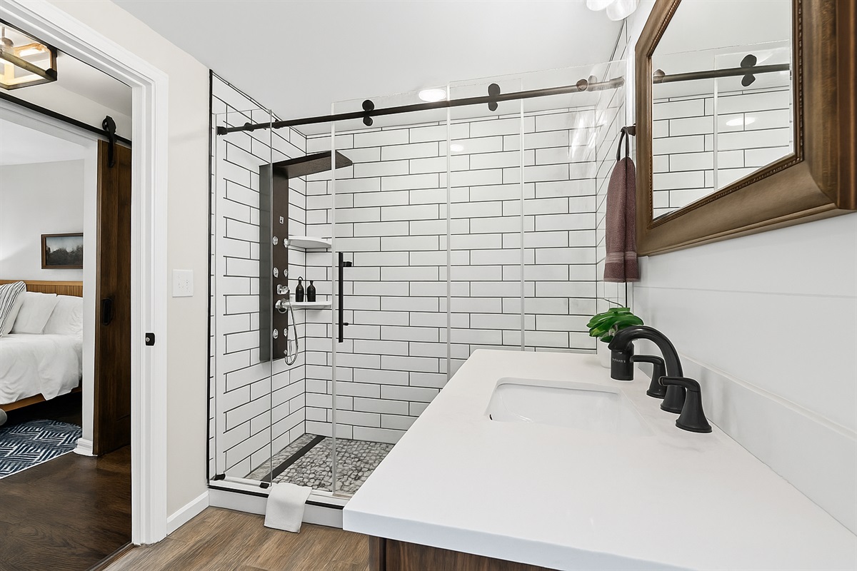 Beautiful en-suite bath with walk-in shower—just steps from the comfort of your bedroom.