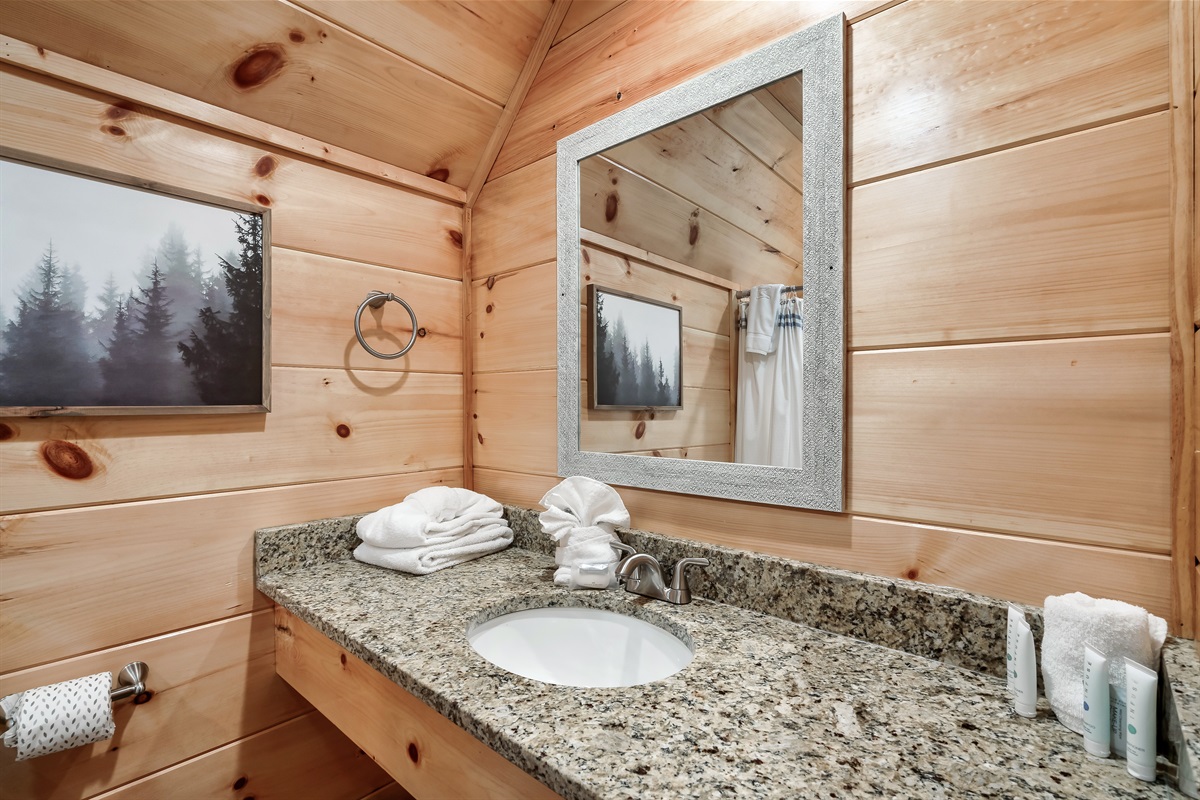 Bathroom with starter supplies and towels. 