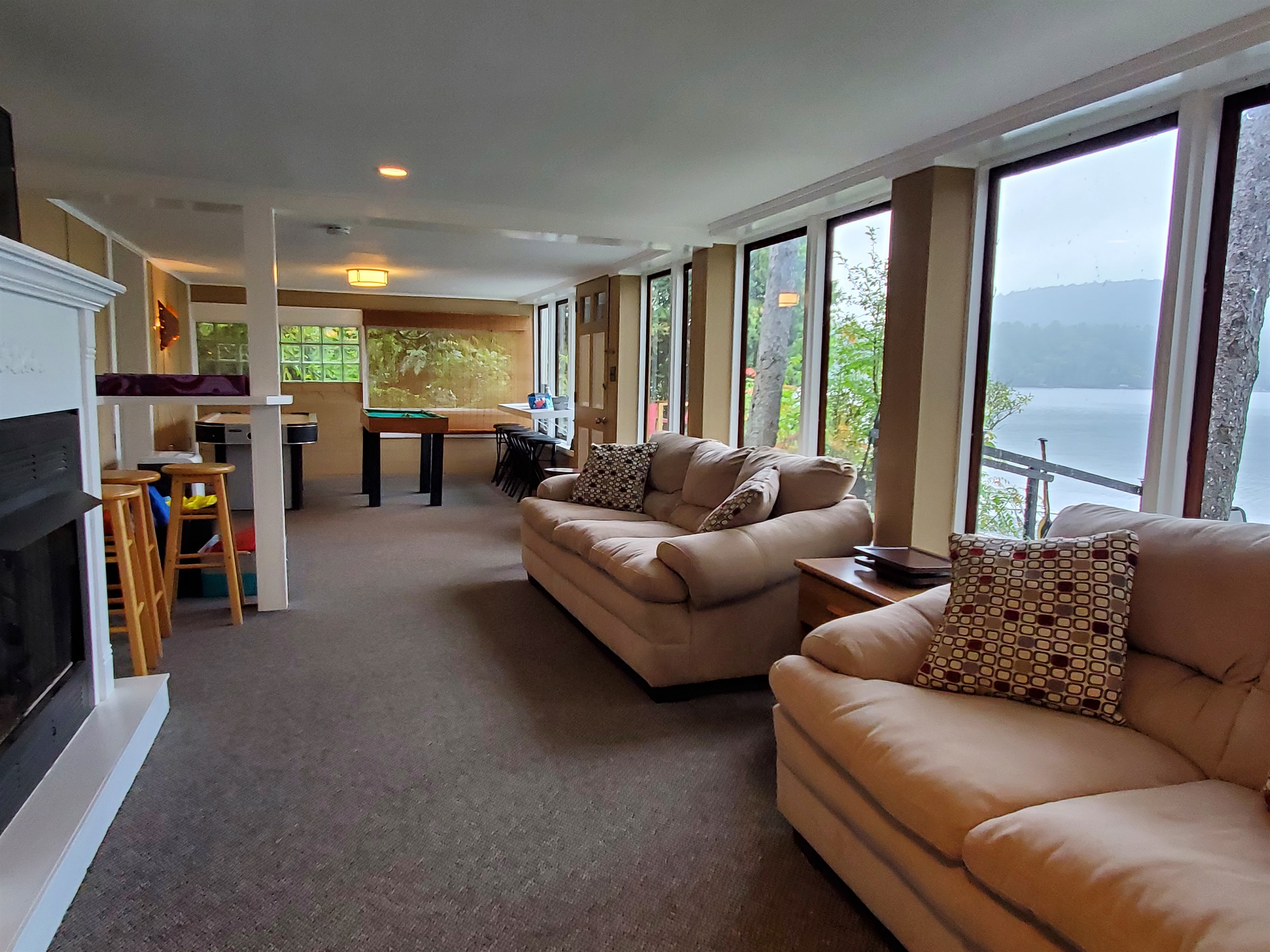 Peaceful lakeviews the full length of the lower level game room