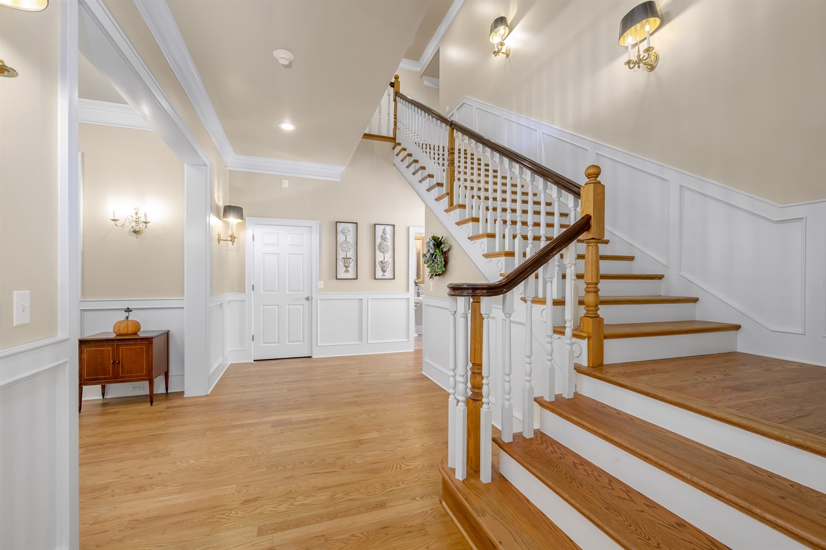 Foyer leading to half bath