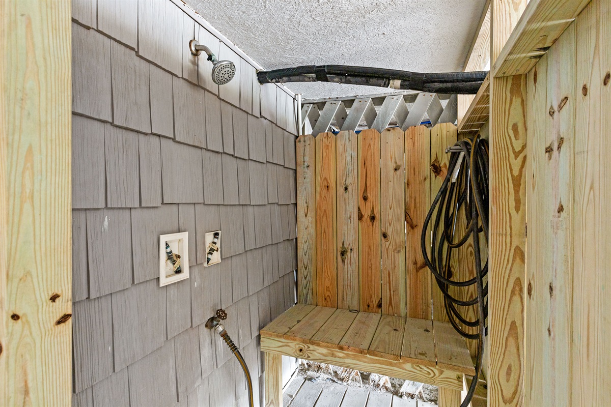Outdoor rinse station&mdash;perfect for washing off sand after the beach