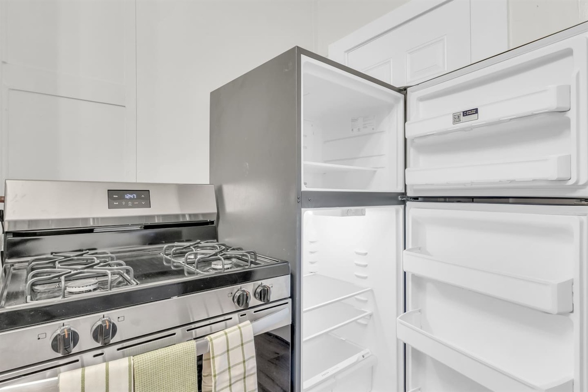 Refrigerator with freezer for all your groceries.