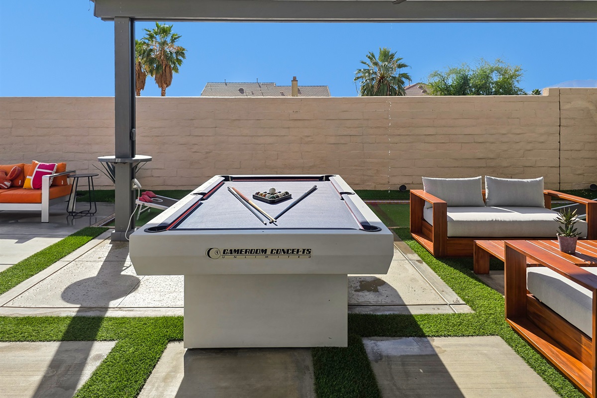 The outdoor pool table is an 8-foot regulation size table.
