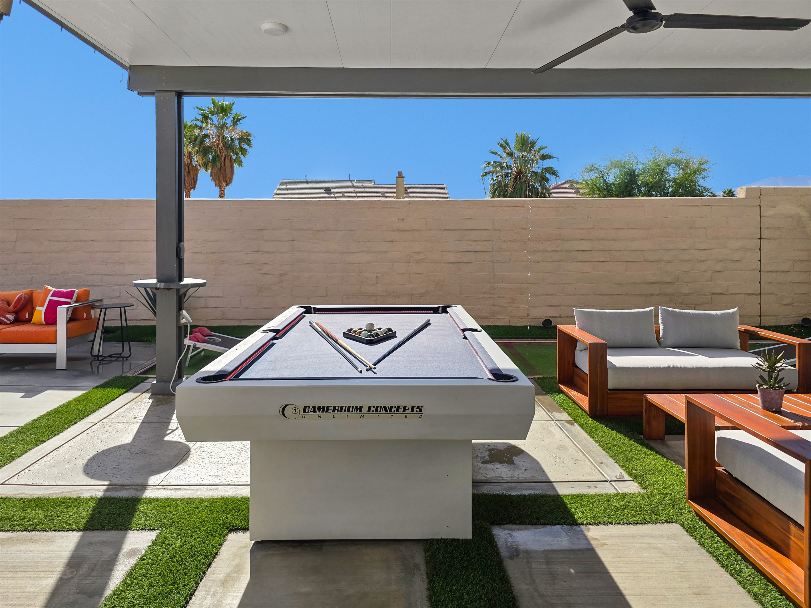 The outdoor pool table is an 8-foot regulation size table.