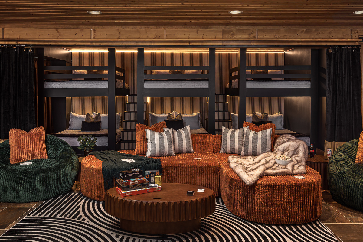 {Custom Bunk Room} Three built-in queen-over-queen bunks create an unforgettable sleeping space for kids, teens, and adults—perfect for large groups traveling together.