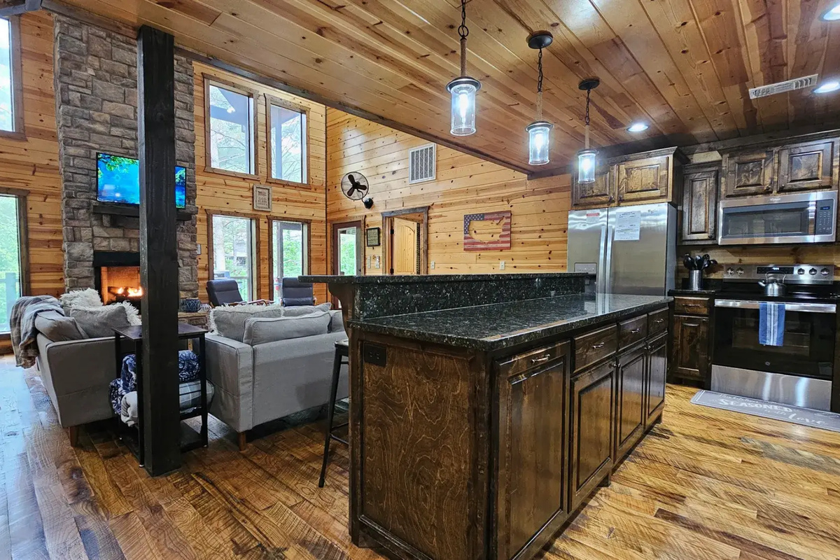 Living Room: Sun-drenched retreat with rustic charm and stunning nature views! Perfect for unwinding.