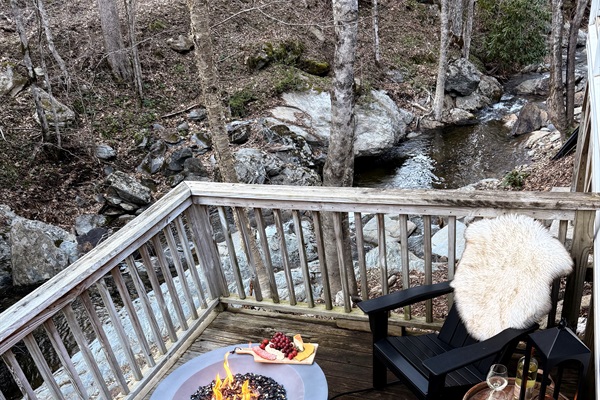 Enjoy the lower deck with gorgeous propane firepit with the creek rushing just feet away!