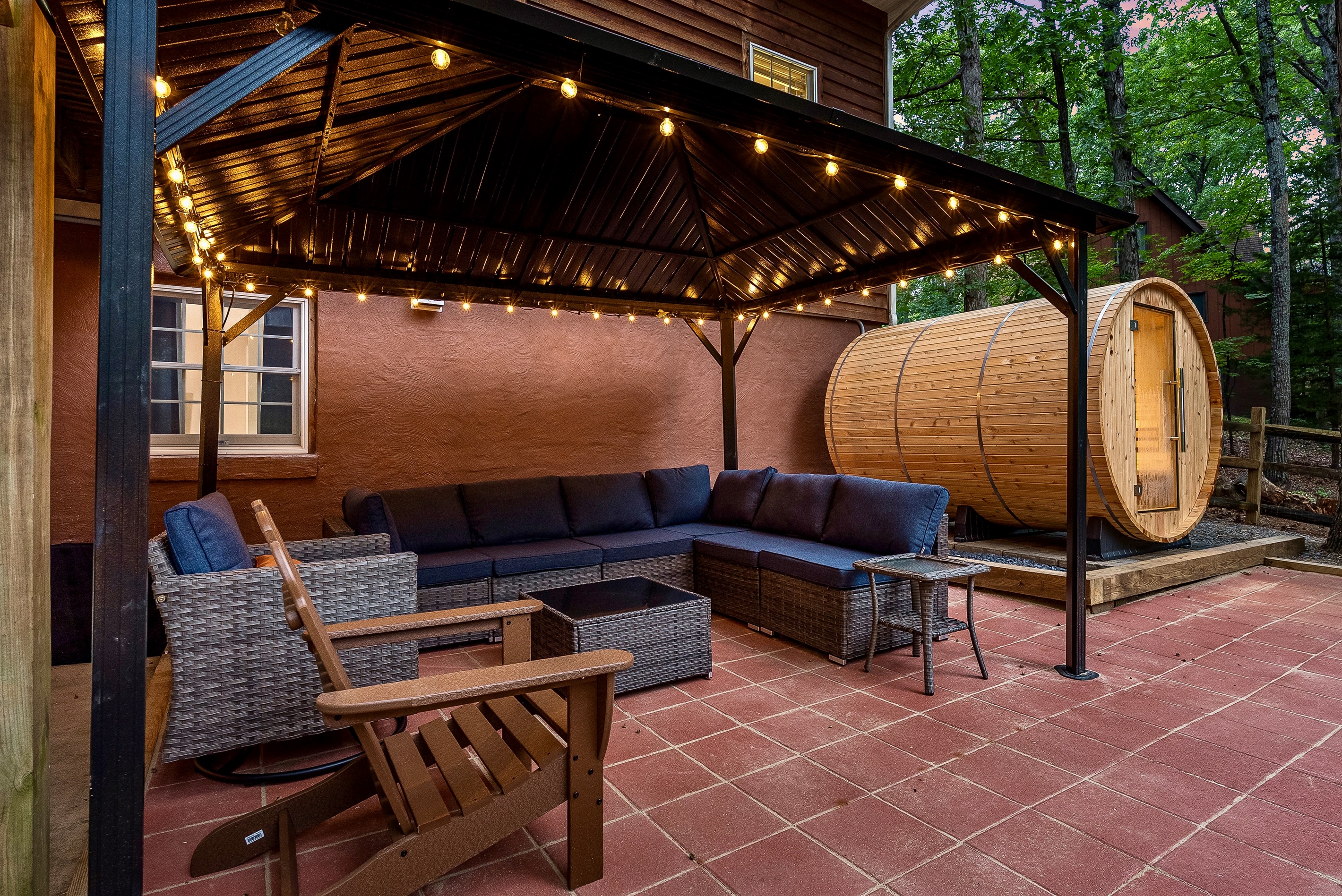 Plenty of seating for the whole group—relax in style under the twinkle lights