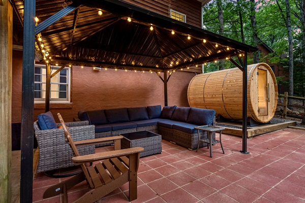 Plenty of seating for the whole group—relax in style under the twinkle lights