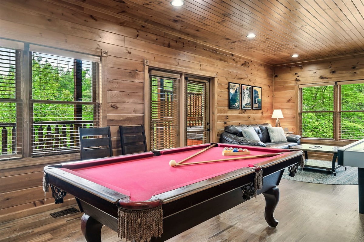 Pool table on the lower level (extra fridge located nearby for convenient drinks & snacks)
