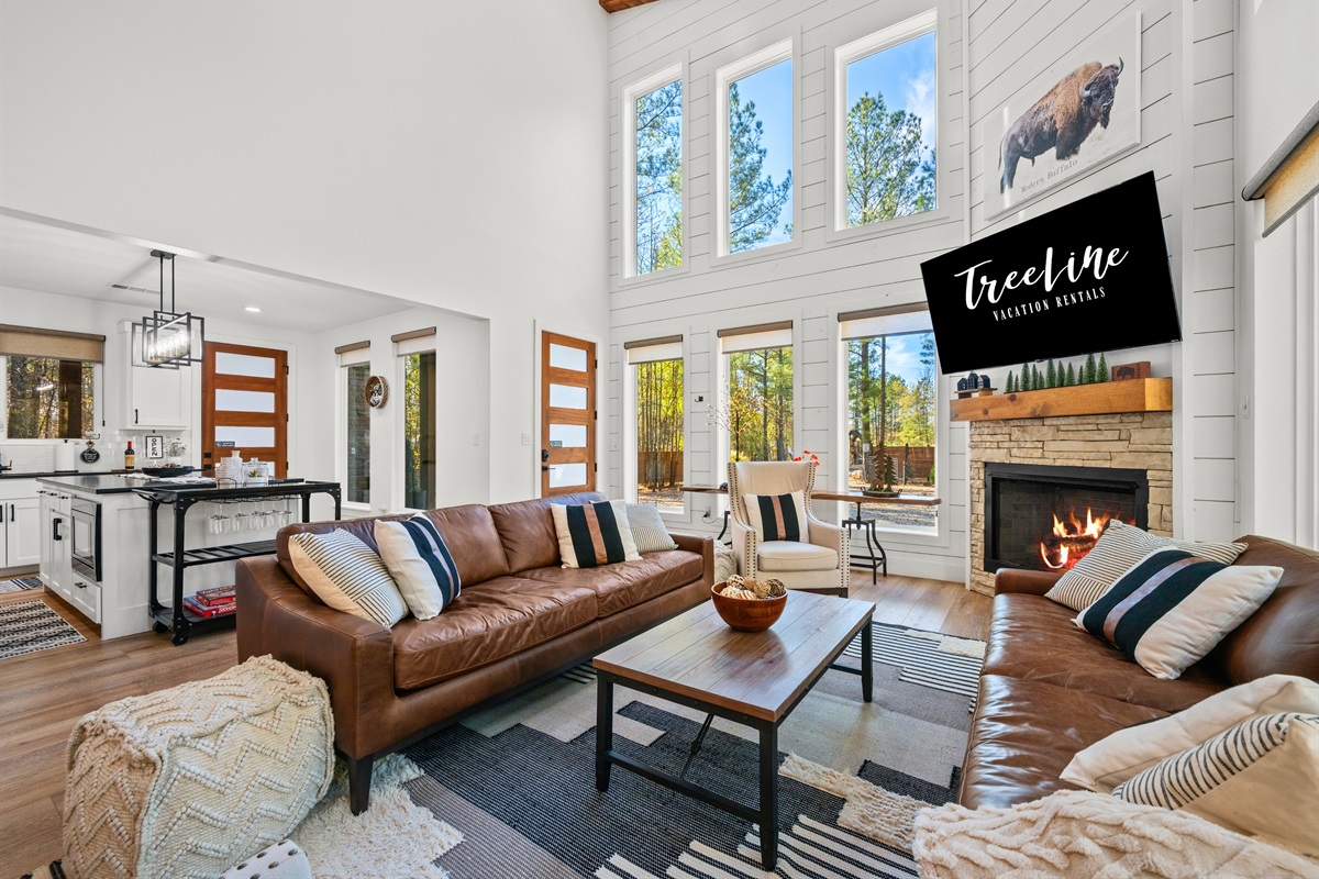 From this angle, the open layout shows how seamlessly the living room connects to the kitchen and dining space.