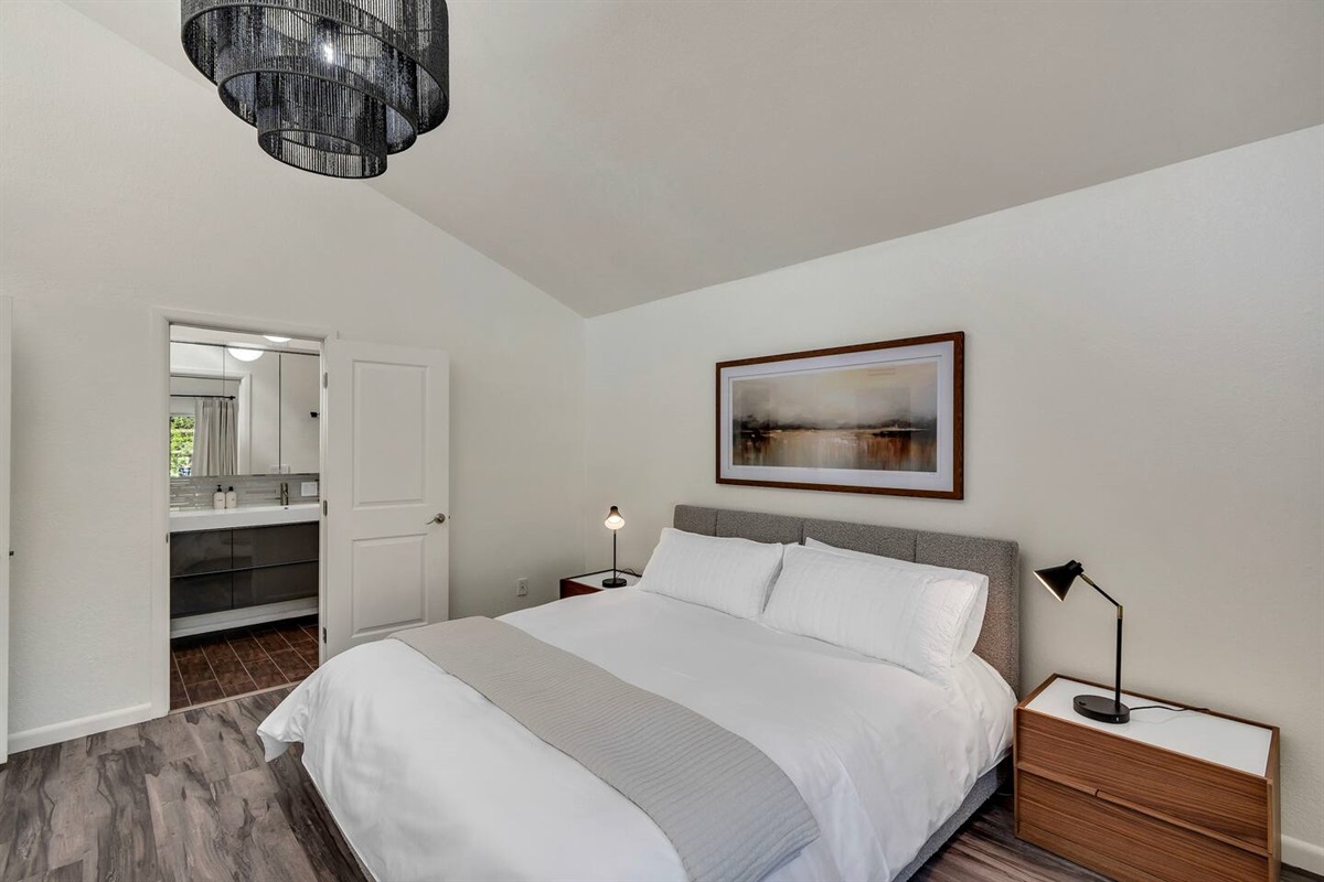 King bed and bathroom in master.