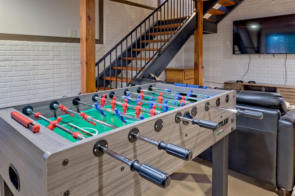 Fun foosball setup in the basement arcade area.