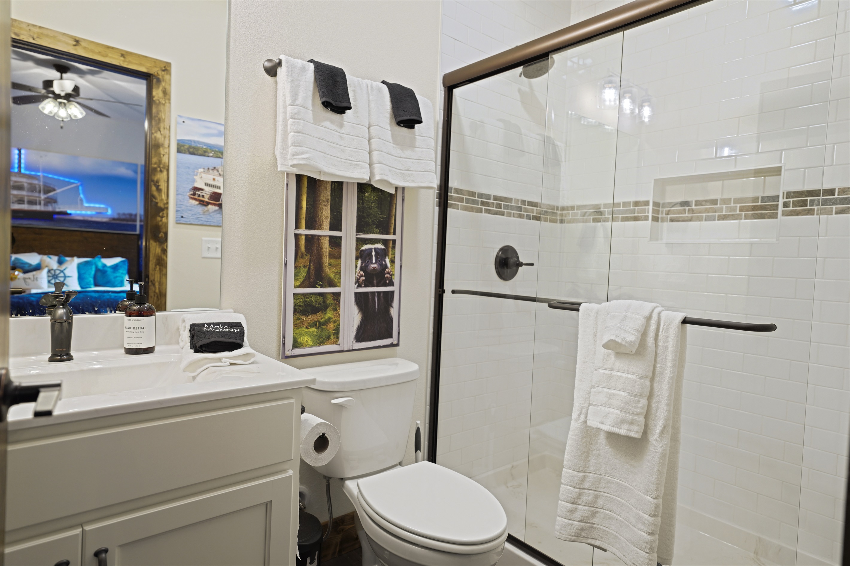 Walk in shower with floor to ceiling tile