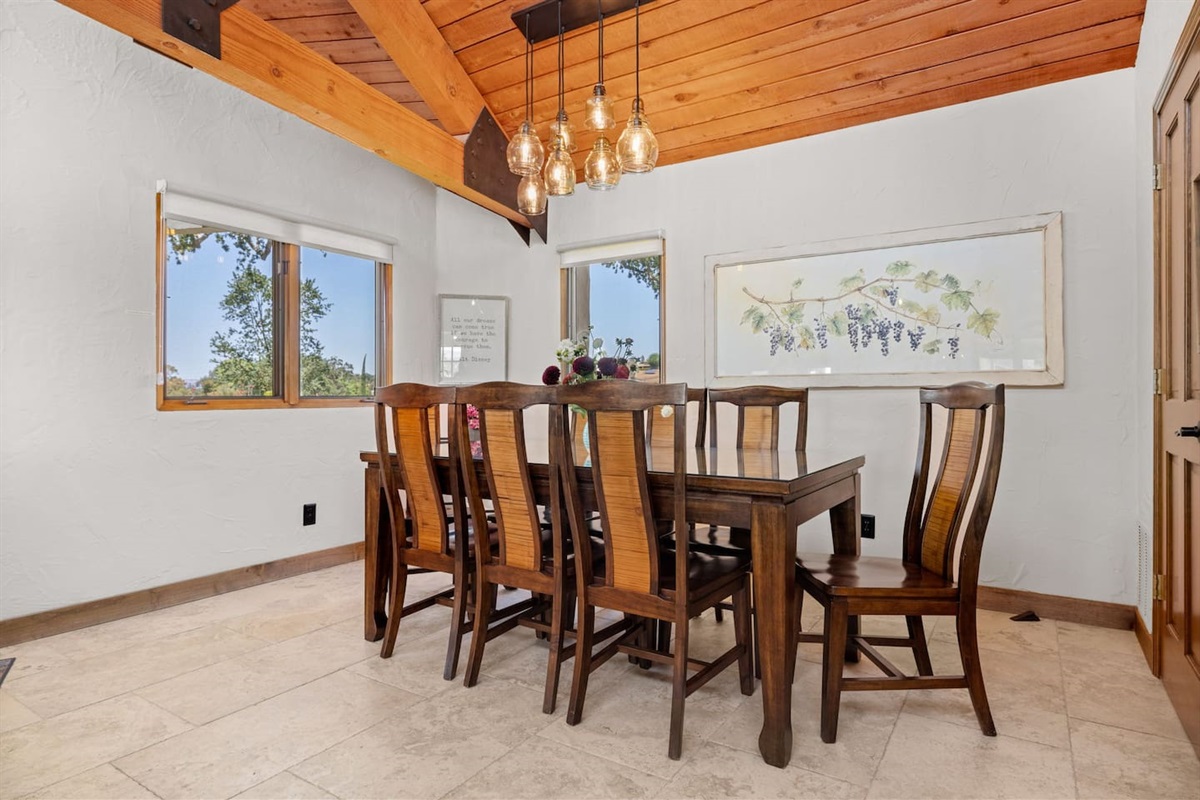 Dining room table next to pantry.  A table made for stories, celebrations, and great food. Meals taste better when shared in paradise.  From quick breakfasts to long dinners.