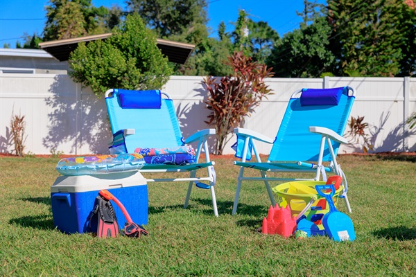 Beach room full of Towels, 10 Beach chairs, Snorkeling gear, Beach Toys, wagon, backyard games, umbrella,  mat, and a Cooler!